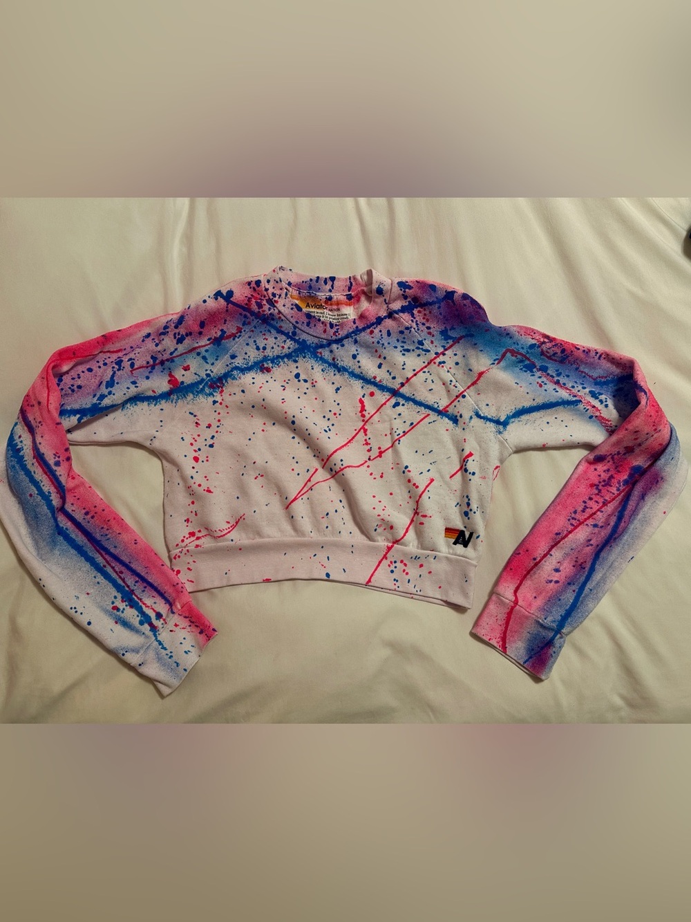 Aviator Nation Paint-Splatter Cropped Sweatshirt in White, Pink & Blue. Large